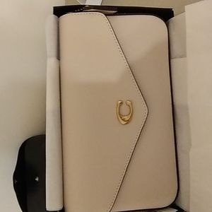 Coach women's leather wallet with strap